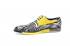 Modèle de sneaker Stripes, en nappa jaune et zèbre nappa.