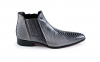  Astute model ankle boot, manufactured in black and white crotalo. 