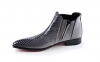  Astute model ankle boot, manufactured in black and white crotalo. 