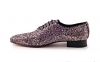 Modèle de chaussure Star, fabriqué en multicolores glitter. 