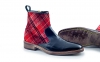 Glasgow model short-leg boot, manufactured in black nappa and red scottish 
