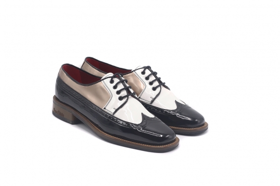 Zapato modelo Skipper, fabricado en Charol Negro,Blanco,Bronce