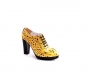 Yellow Reptile model shoe, made in yellow alligator.