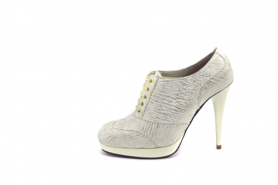 Fasionable model shoe, made of zebra print linen.