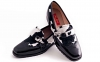 Dupon model shoe, made in black patent leather and black-white cow