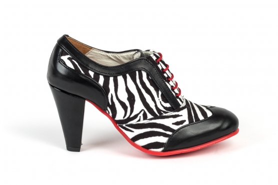  Cebralia model shoe, manufactured in black napa and black zebra.