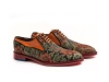 Modèle de chaussure Segoriano, fabriquée en fantaisie bedel et cuir verni mandarine.