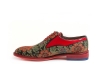 Modèle de chaussure Braviano, fabriquée en fantaisie bedel et cuir verni rouge.