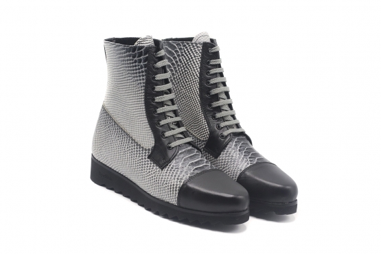 Vitaly Ankle Boot model, manufactured in Anaconda Negra y Blanca