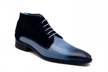 Western model ankle boot, manufactured in blue colt and sky nappa.