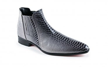  Astute model ankle boot, manufactured in black and white crotalo. 