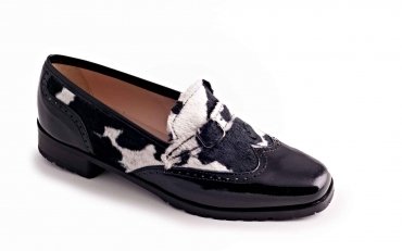 Dupon model shoe, made in black patent leather and black-white cow