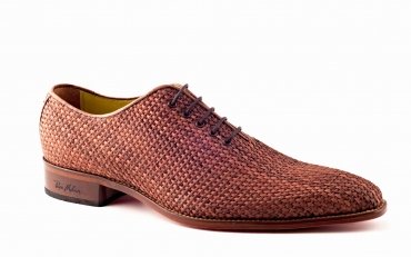 Modèle de chaussures Tierra, fabriqué en tressée brune.