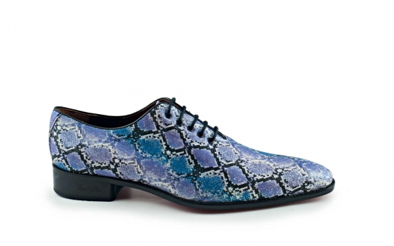 Zapato modelo Mayle, fabricado en glitter serpiente lila.