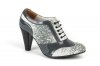 Isabella model shoe, made in white-gray tejus and pearl-gray patent leather.